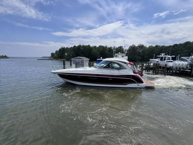 2012 Formula 45 Yacht “Redd Therapy” with Black Cherry hull, shown docked in Maryland, featuring Volvo IPS, FLIR, hardtop, and swim platform.