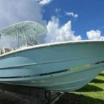 2026 Bulls Bay 255 Center Console with twin Suzuki 150s, deluxe hardtop, and Carolina Blue hull, for sale at Rhode River Boat Sales in Maryland.